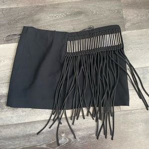 Black mini skirt with fringe